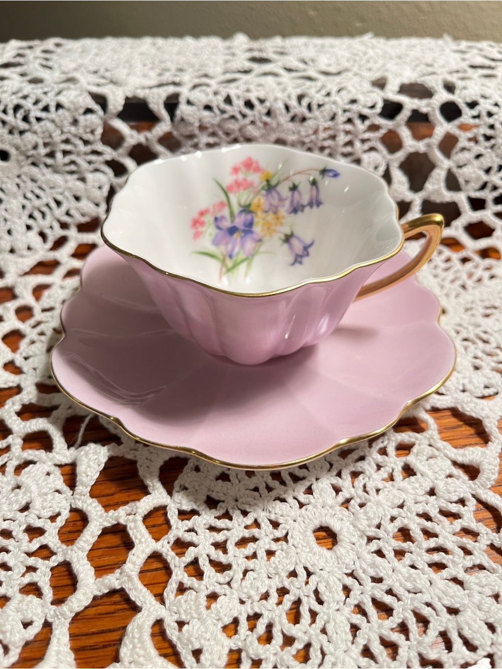 Vintage “Shelly” bone China tea cup and saucer. Gold trim Rose colored